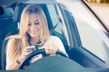 Distracted Woman Texting While Driving
