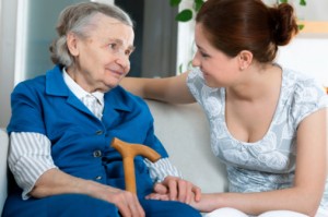 Woman Talking to Elderly Lady - Nursing Home Abuse