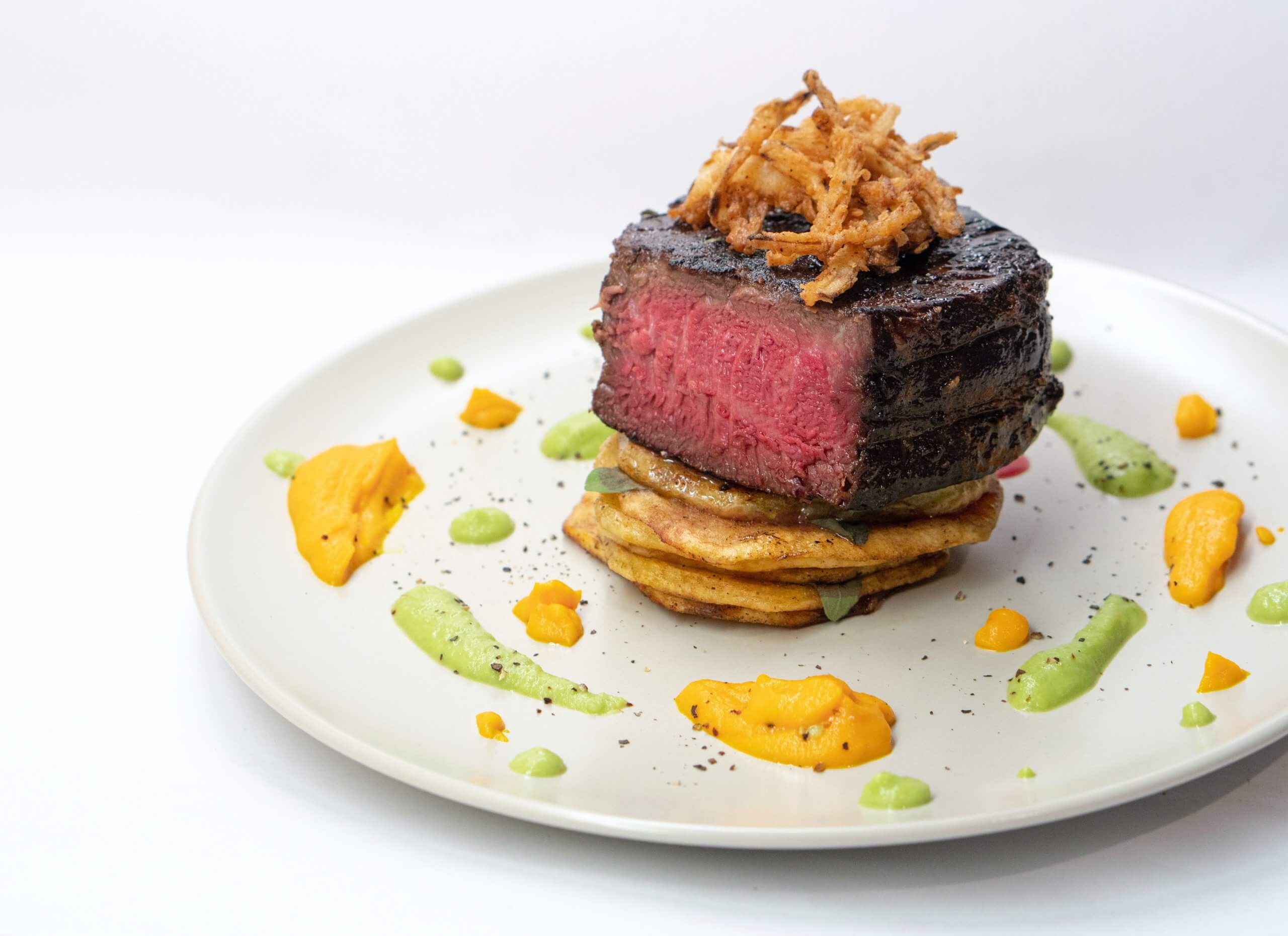 Filet Mignon topped with fried onions - Best Fine Dining Grand Rapids, MI